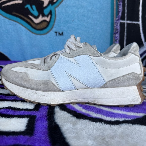 Size M10.5/W12 - New Balance 327 Women's Moonbeam Ice Blue Leather Logo Shoes - Picture 1 of 9